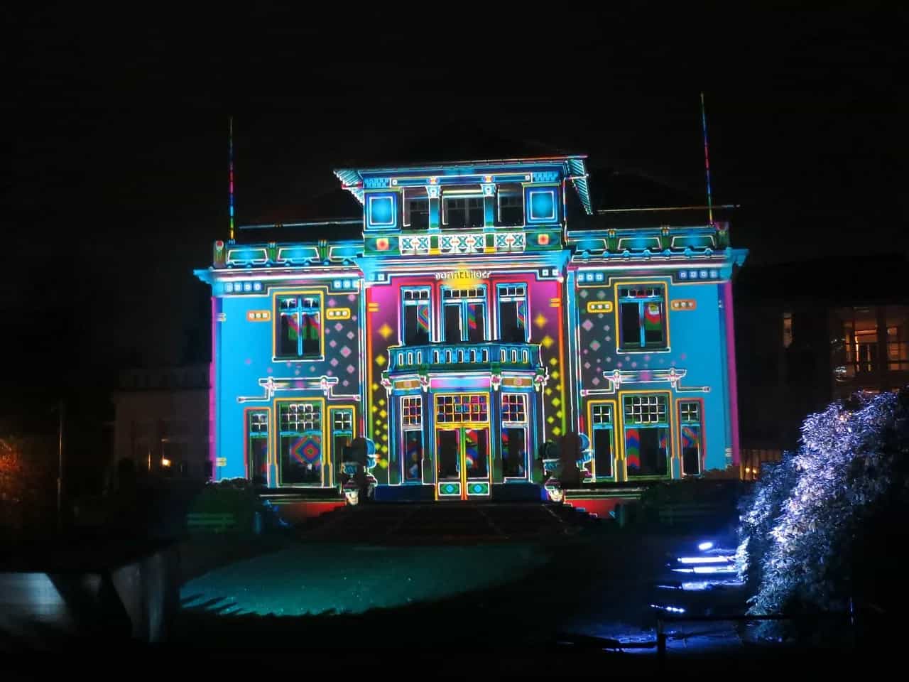 A villa covered in colourful light projections during the GLOW festival, Eindhoven.